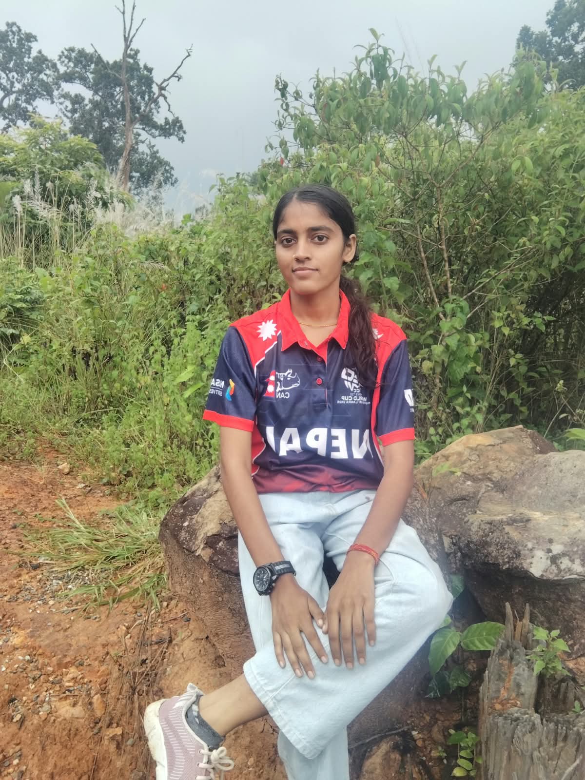Khushbu Sitting on Rock